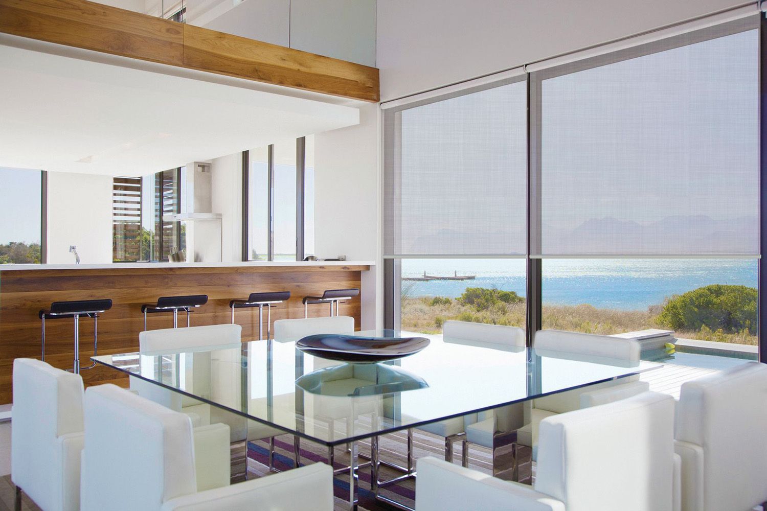 Modern Dining Room Overlooking Coast With Roller Blinds