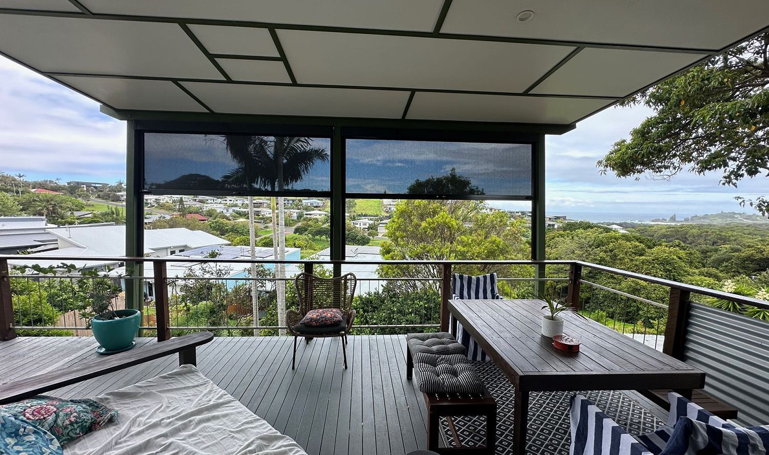 Deck With Outdoor Seating And Zipscreen Awnings