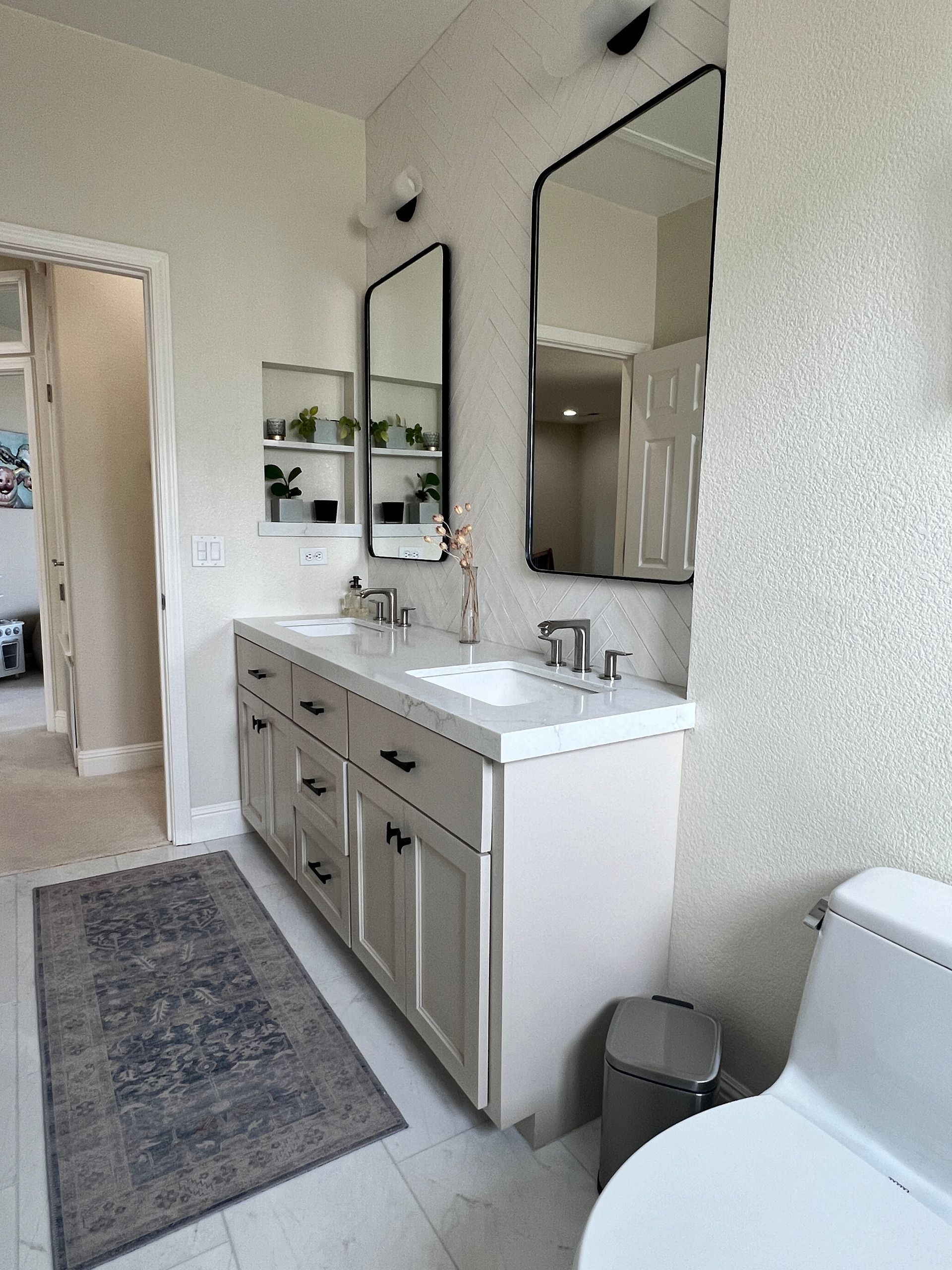 Workon Construction custom vanity, tile, and niche