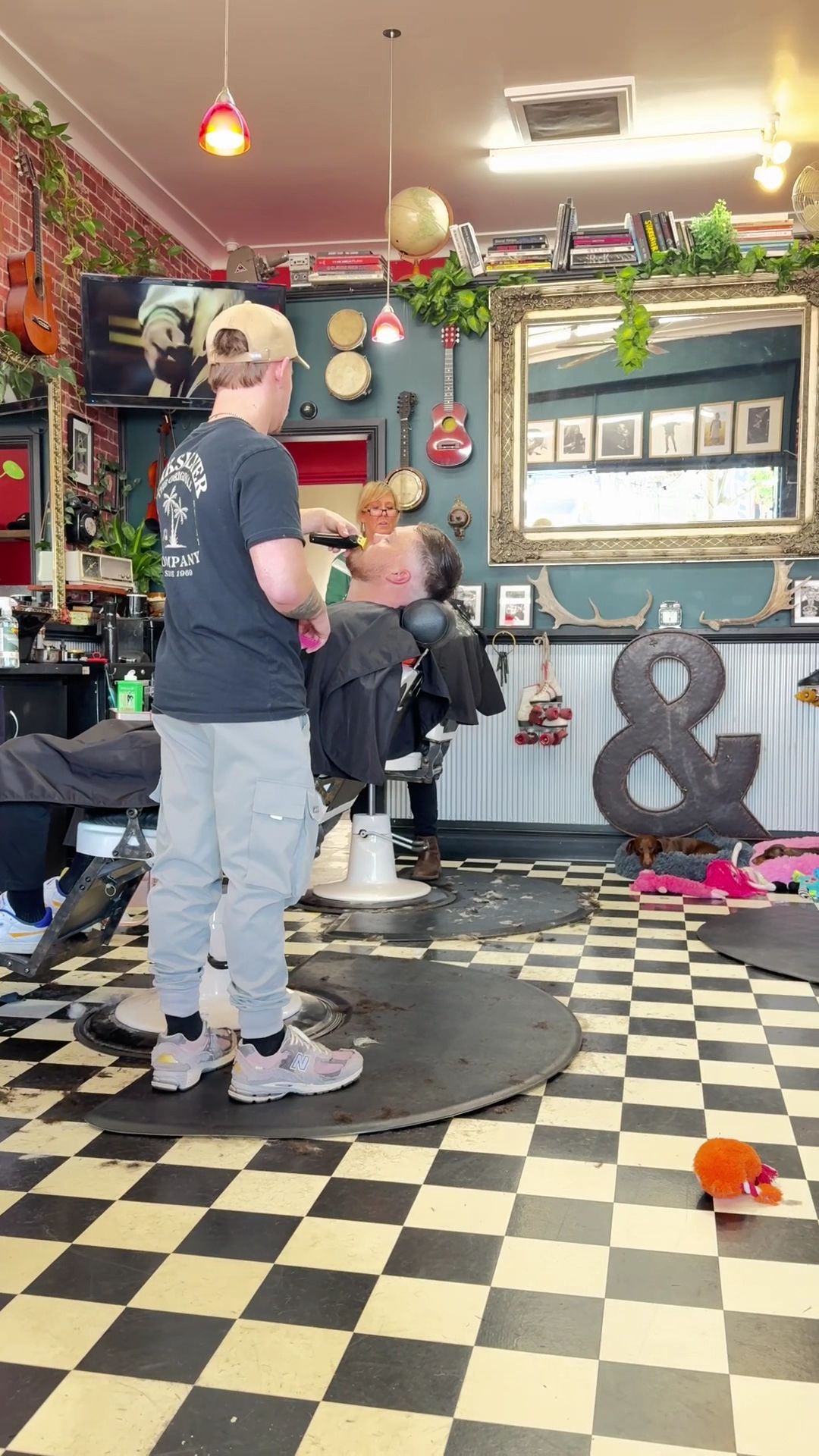 A Barber in Trims a Client Beard in A Salon — The Barber Social In Raymond Terrace, NSW