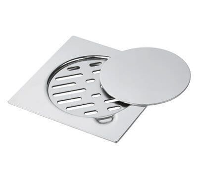 Stainless steel square floor drain with a removable, circular cover.
