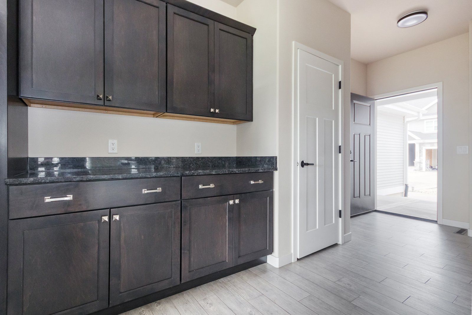 kitchen with dark cabinets