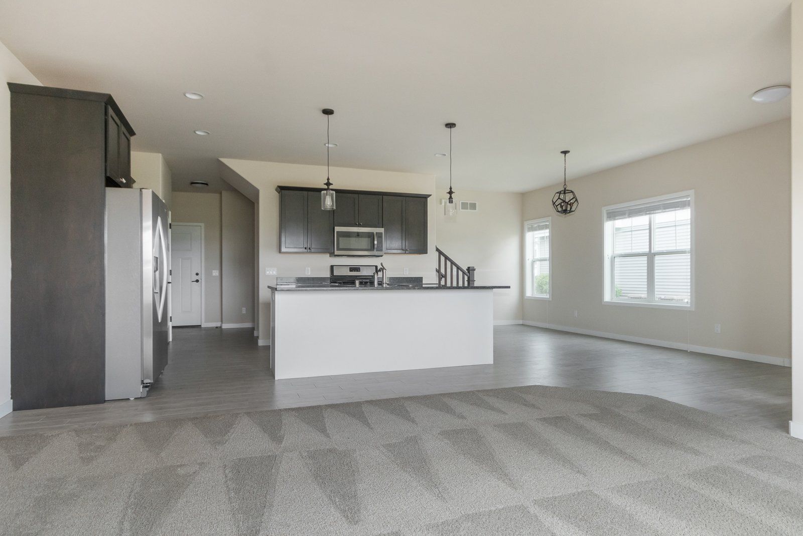 Aspire Homes living room looking into kitchen