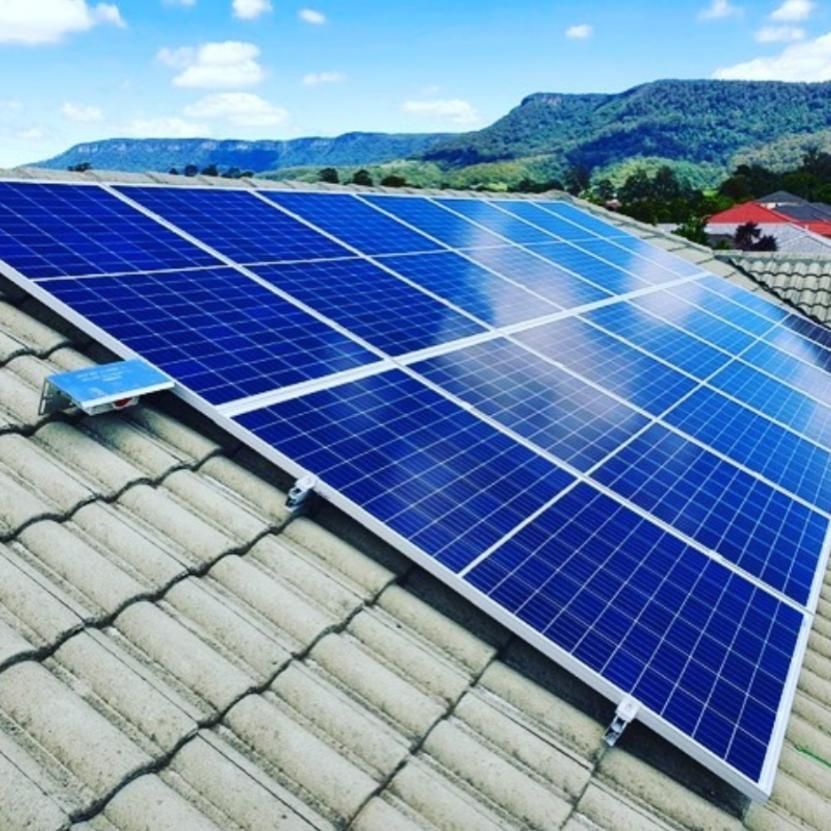A Roof With a Lot of Solar Panels on It — Leading Edge Computers in Forster, NSW