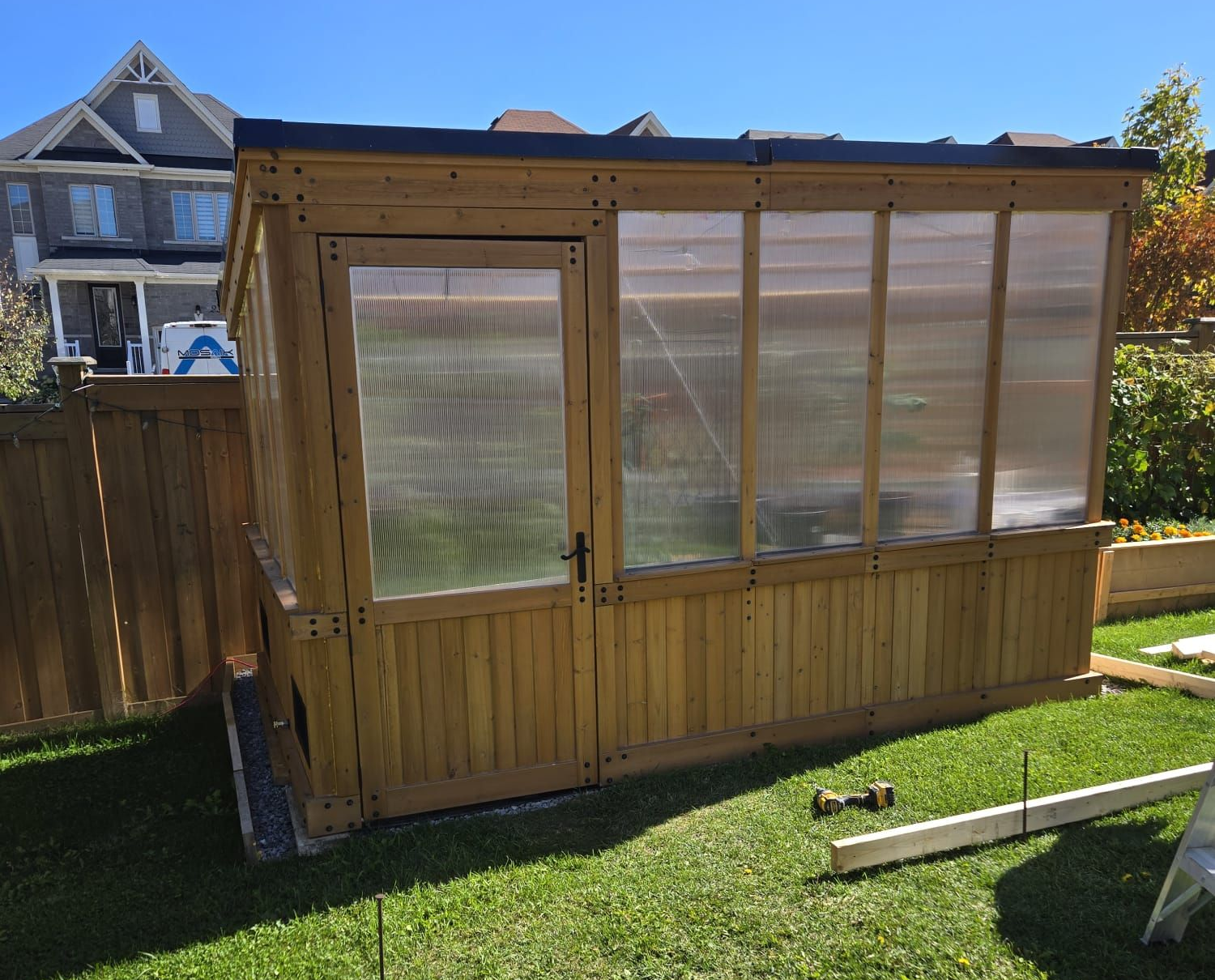 Backyard greenhouse built for year-round growing in Canada