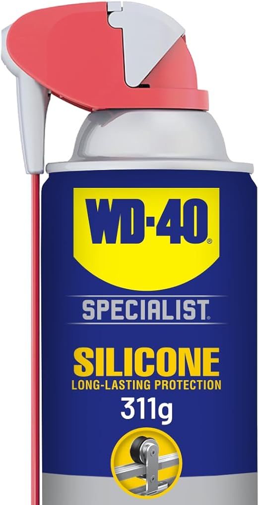 WD-40 silicone spray for greenhouse doors and hinges