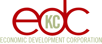 A red and white logo for the economic development corporation