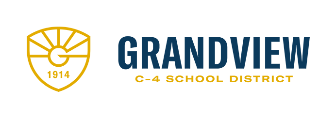 The grandview c-4 school district logo is a shield with a sun on it.