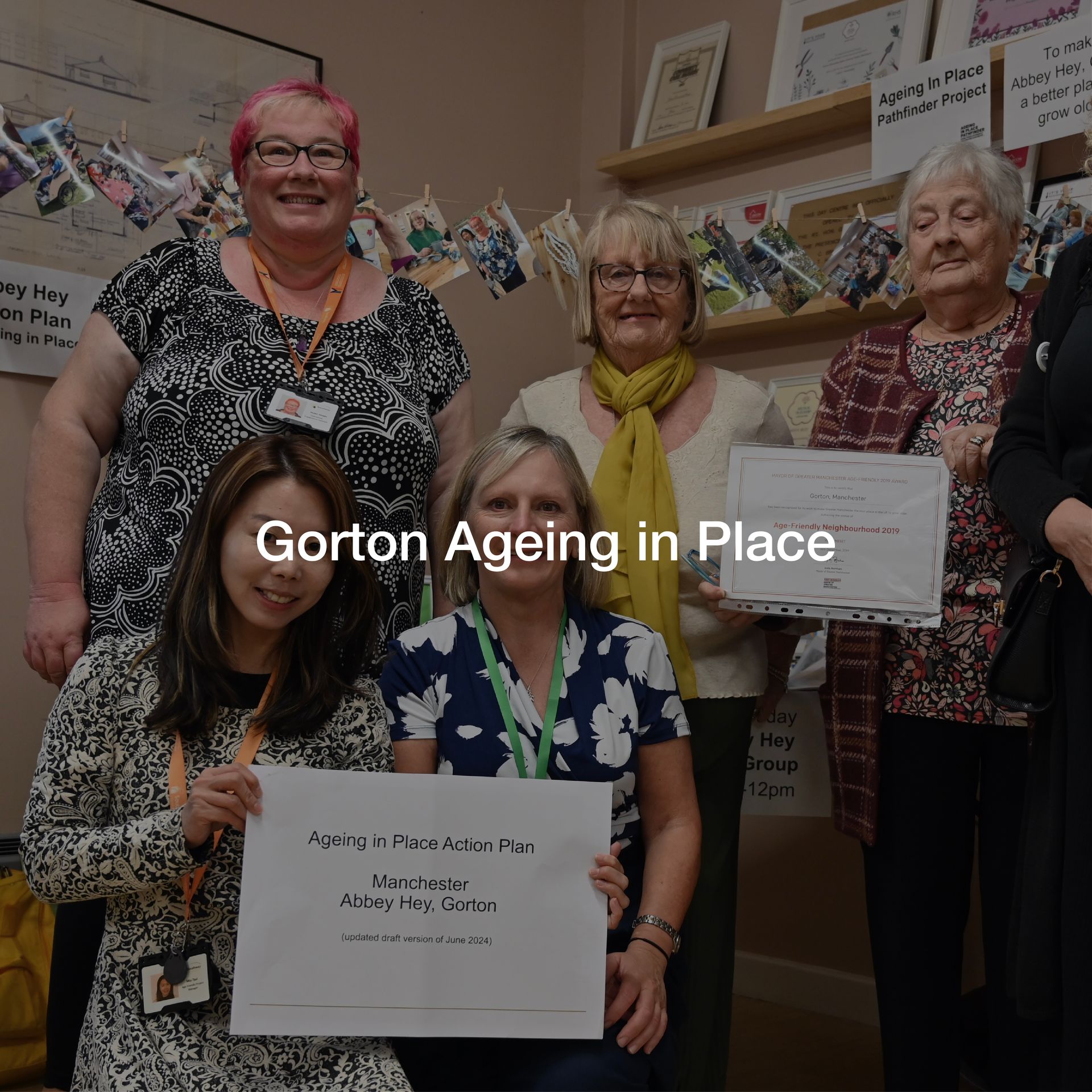 A group of women are posing for a picture and the caption says gorton ageing in place