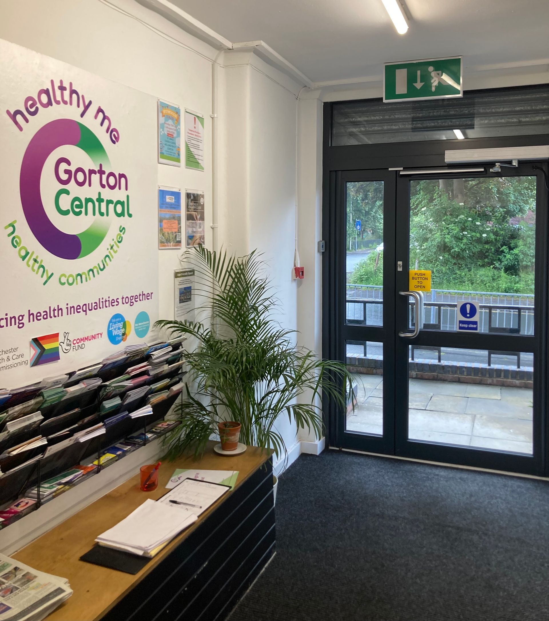 A room with a sign that says healthy me gorton central