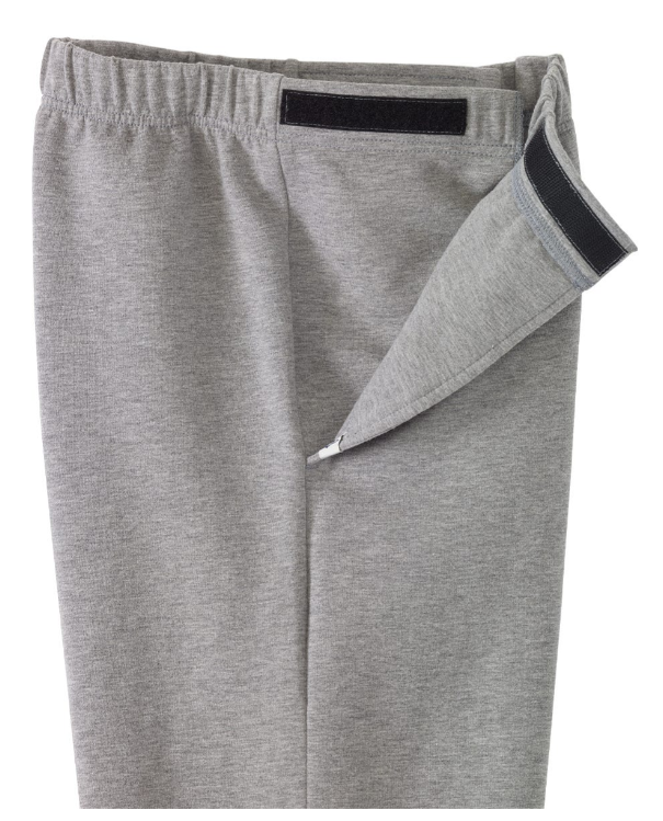 Gray adaptive sweatpants with a black waistband and a side leg opening being pulled open to show the inner layer