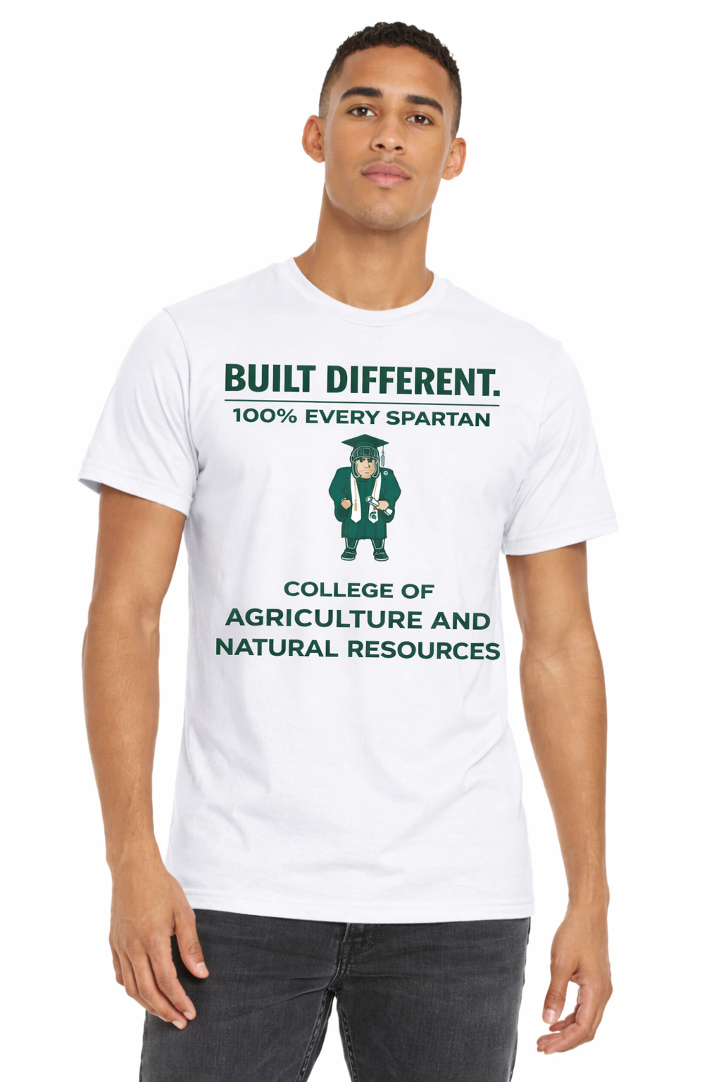 A man wearing a white t-shirt featuring a green Spartan mascot logo and text: 
