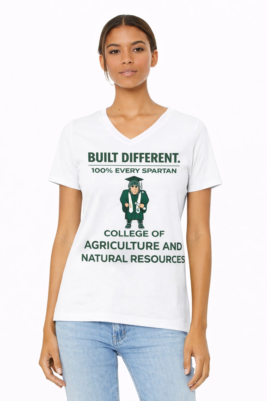 A woman wearing a white V-neck t-shirt that says 