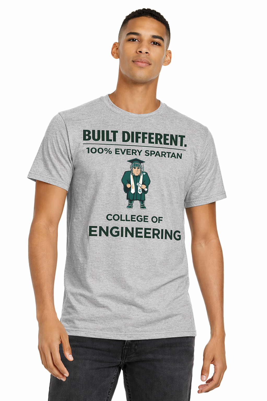 Gray graphic tee with “Built Different” and “College of Engineering” text, worn by a standing model.