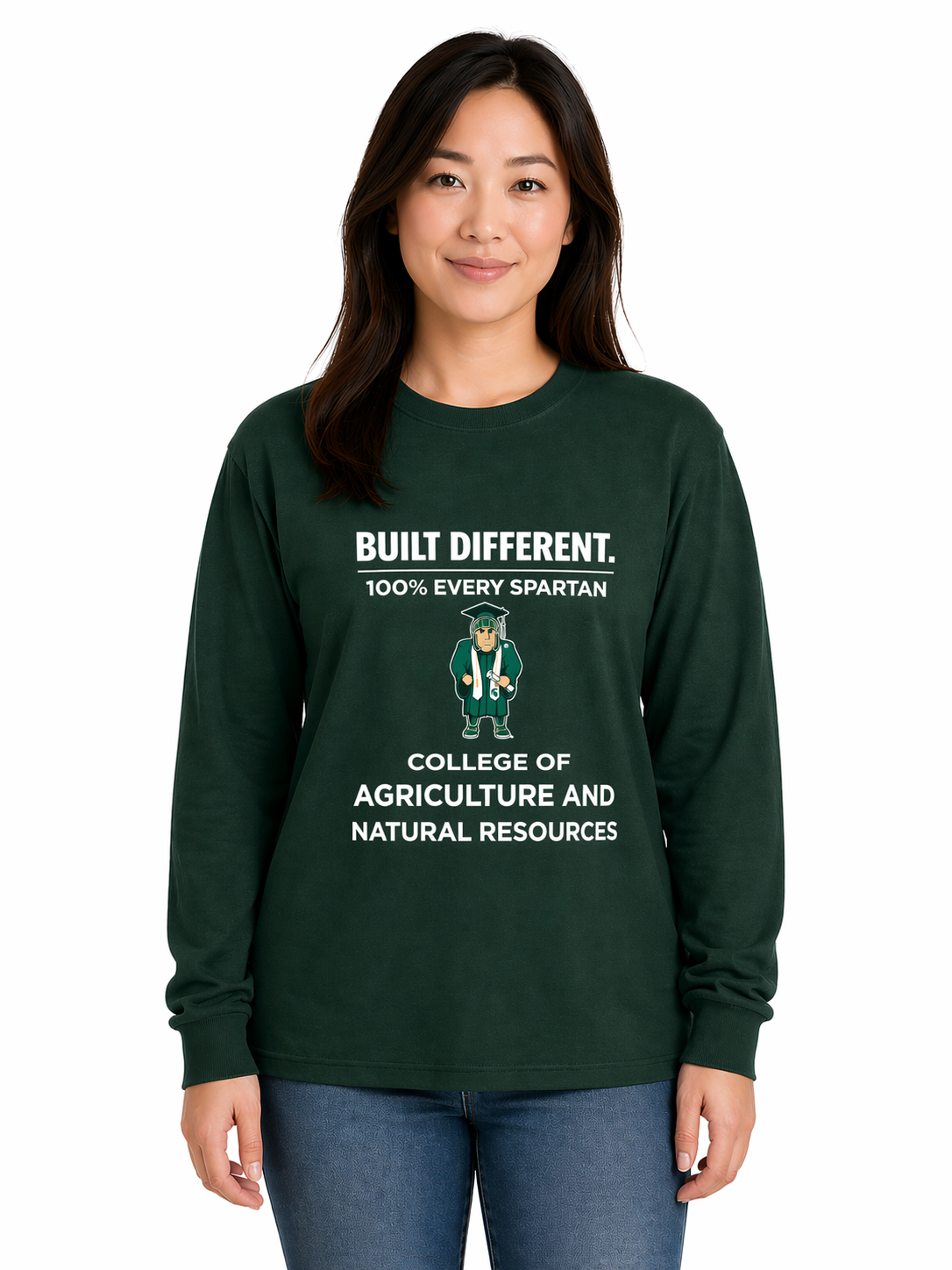 Woman wearing a dark green college sweatshirt and jeans, standing against a white background.