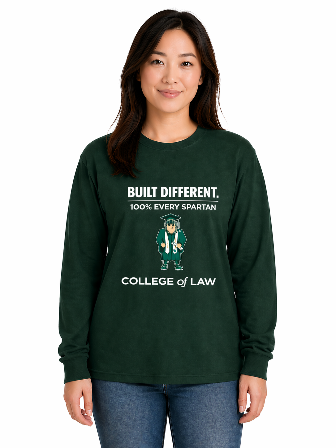 Woman wearing a dark green college sweatshirt with “Built Different” and “College of Law” text, standing against a background