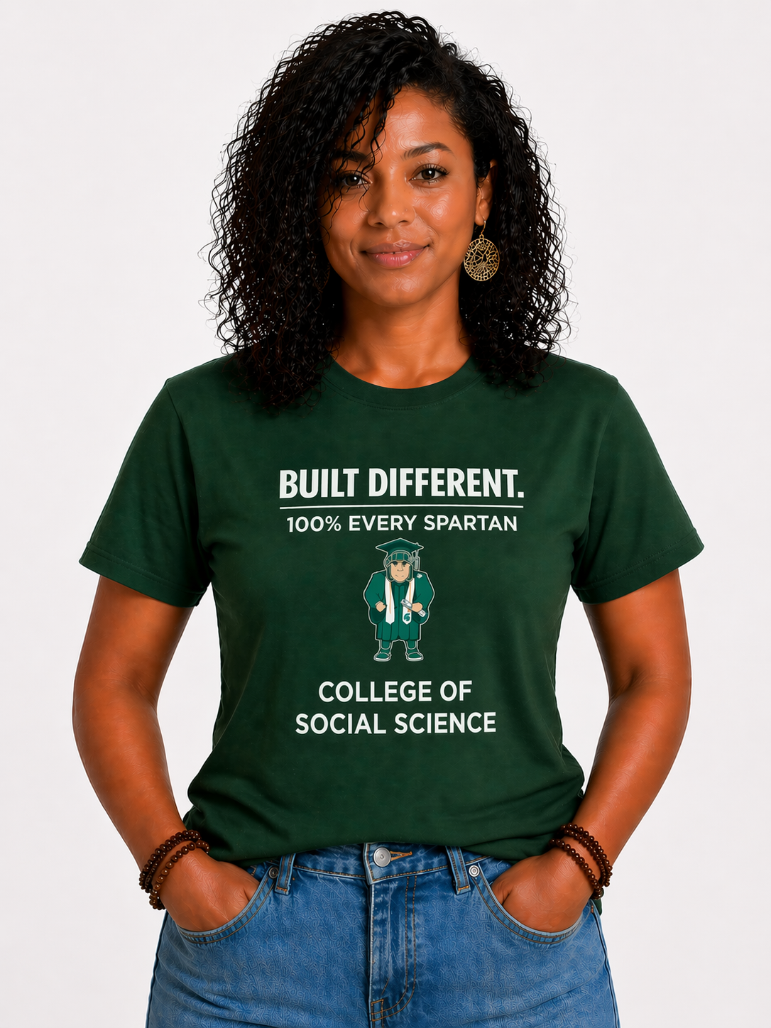 Woman in green T-shirt with college of social science text, standing against a white background.