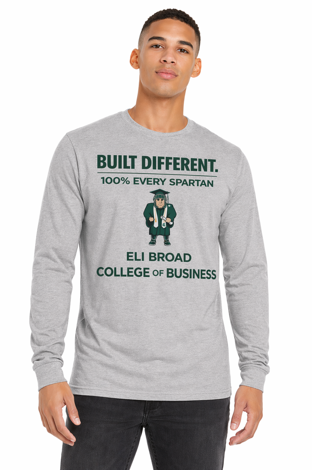 Man wearing a gray long-sleeve shirt with “BUILT DIFFERENT” and Spartan graphic text