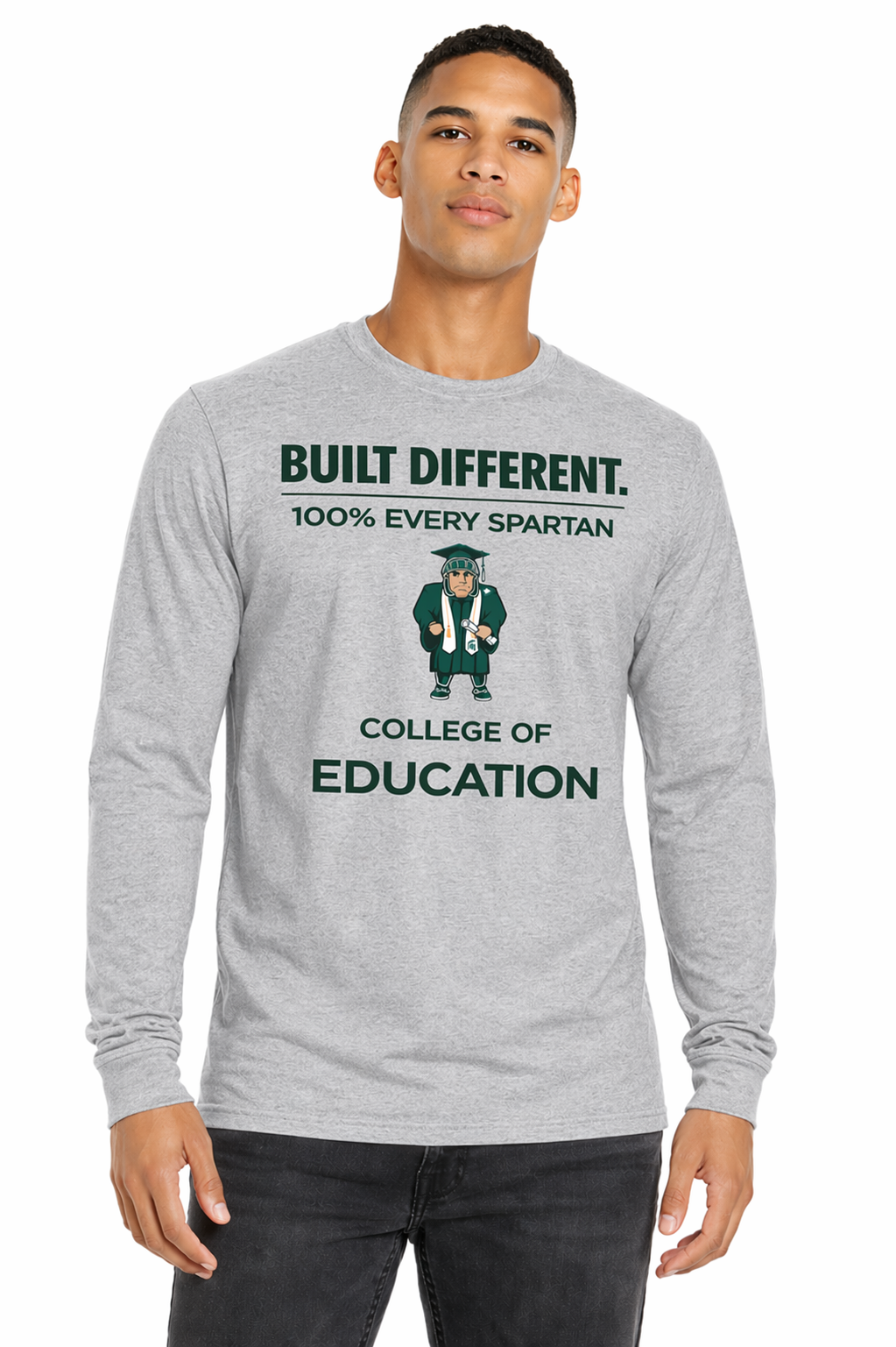 Man wearing gray “Built Different” College of Education long-sleeve shirt on a white background