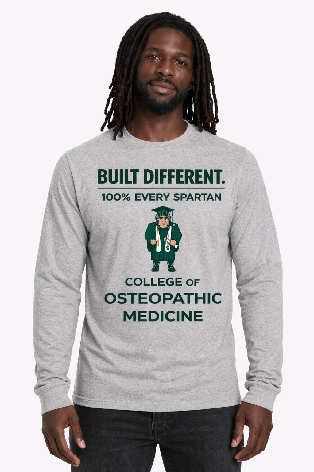 Man wearing a gray sweatshirt with “BUILT DIFFERENT” and a Spartan graphic on the chest.