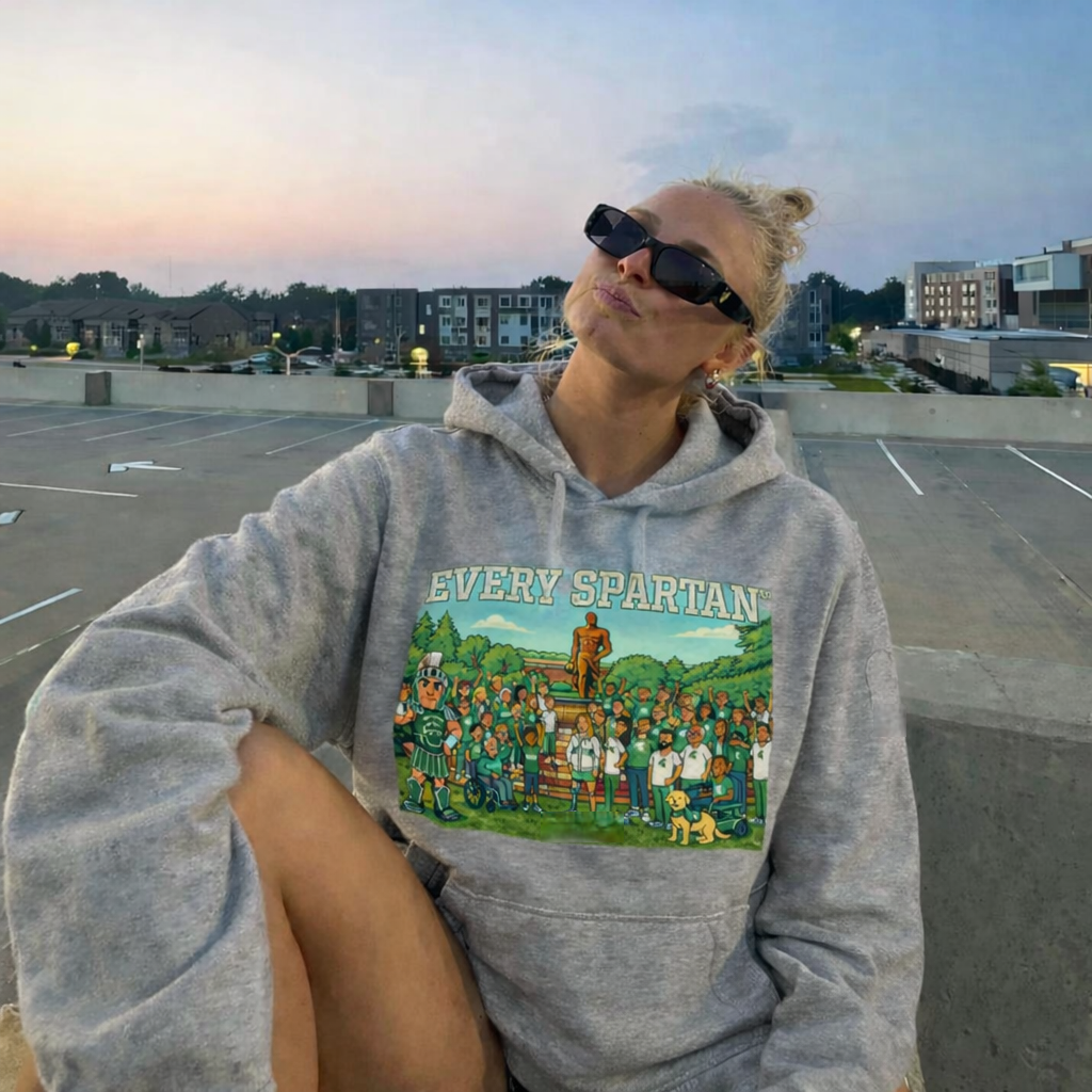 Woman wearing sunglasses and a grey 