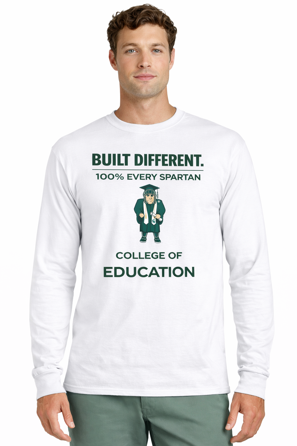 A white long-sleeved shirt with text "BUILT DIFFERENT. 100% EVERY SPARTAN" above a mascot graphic and "COLLEGE OF EDUCATION."