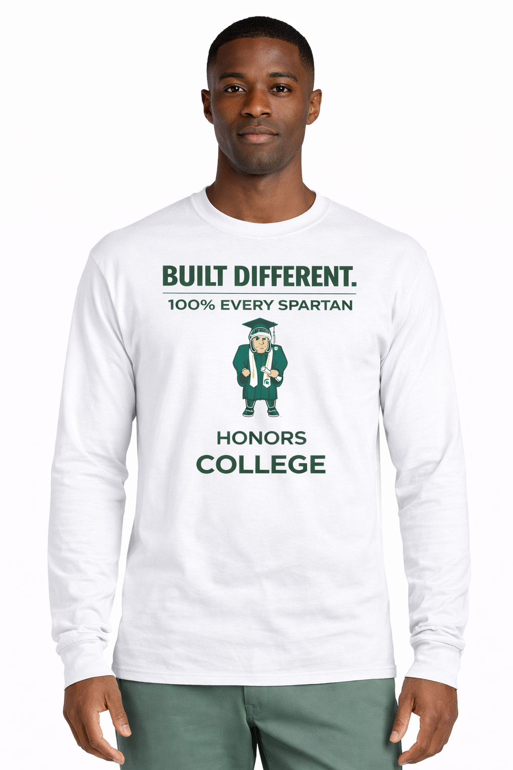 A man wearing a white long-sleeve shirt with green text reading 