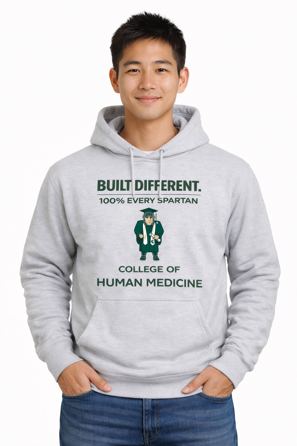 A person wearing a grey hoodie featuring the text 