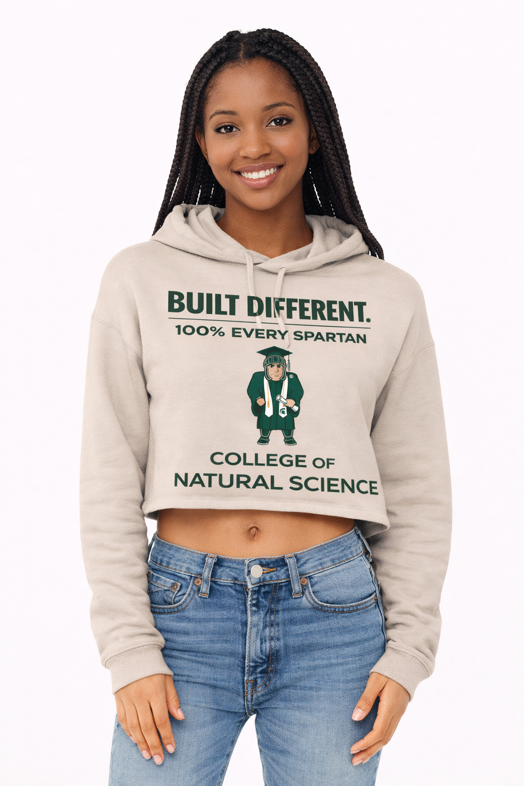 A tan cropped hoodie featuring 