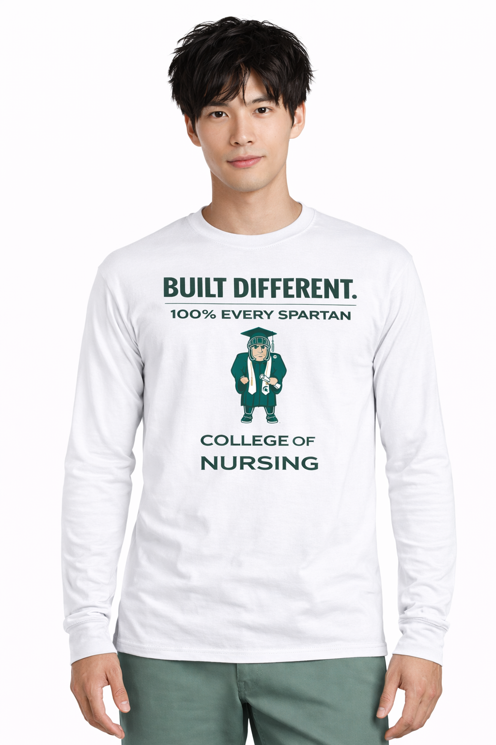 A person wearing a white long-sleeve shirt with green text reading 