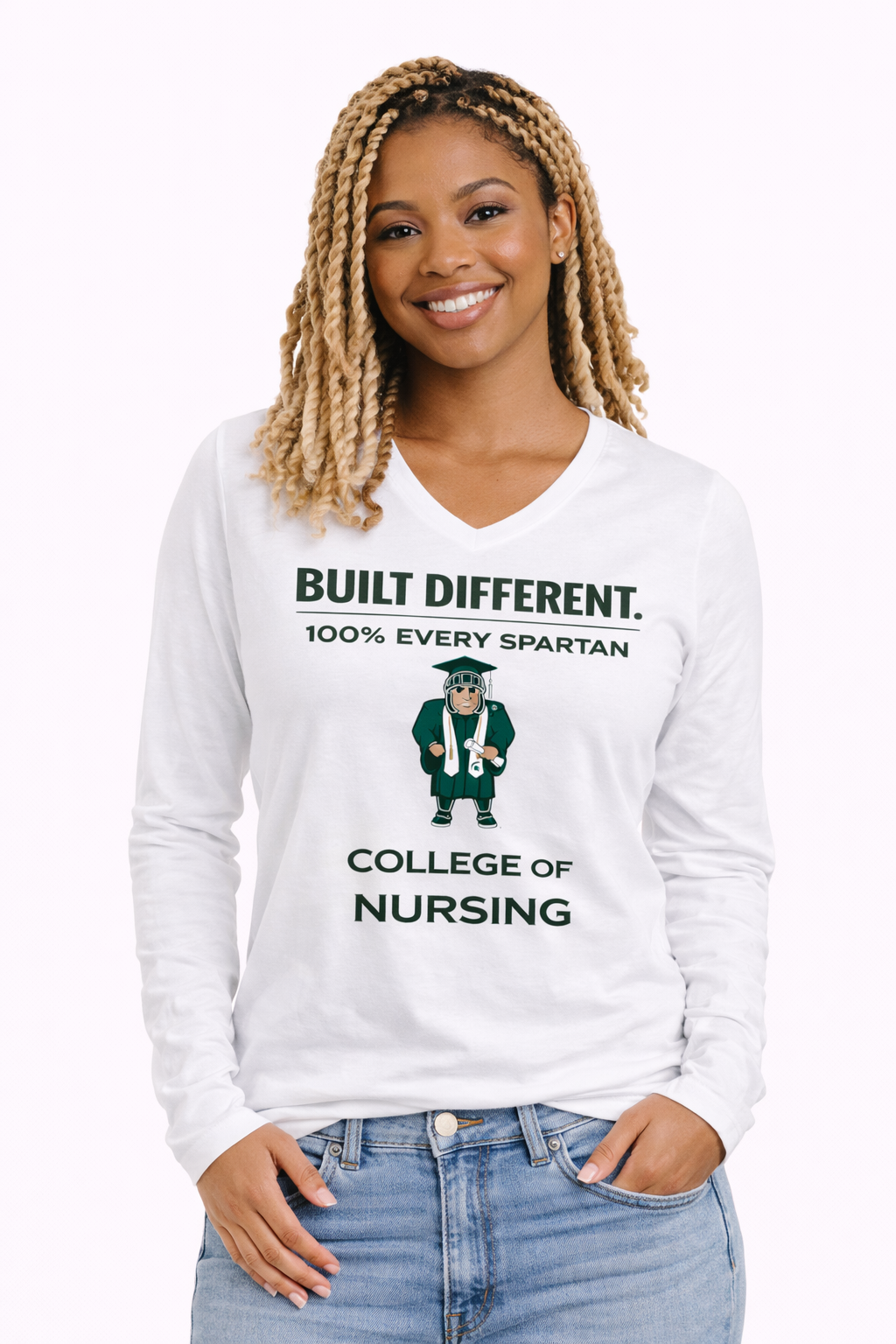 A person wearing a white long-sleeve shirt with a graphic that reads 