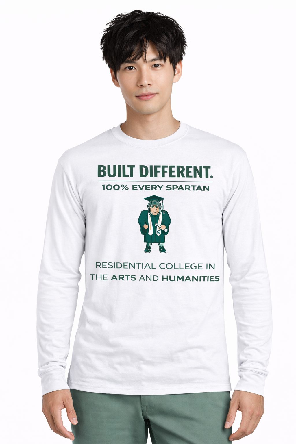 A person wears a white long-sleeve shirt with a graphic that reads 