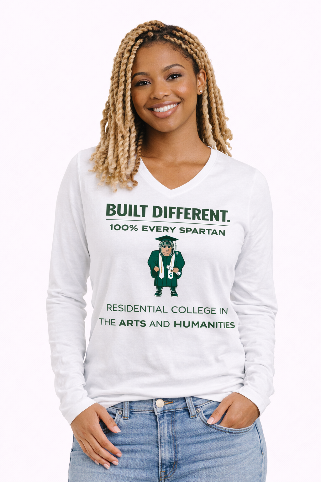 A person wears a white long-sleeve V-neck shirt featuring a Spartan mascot graphic and the text 