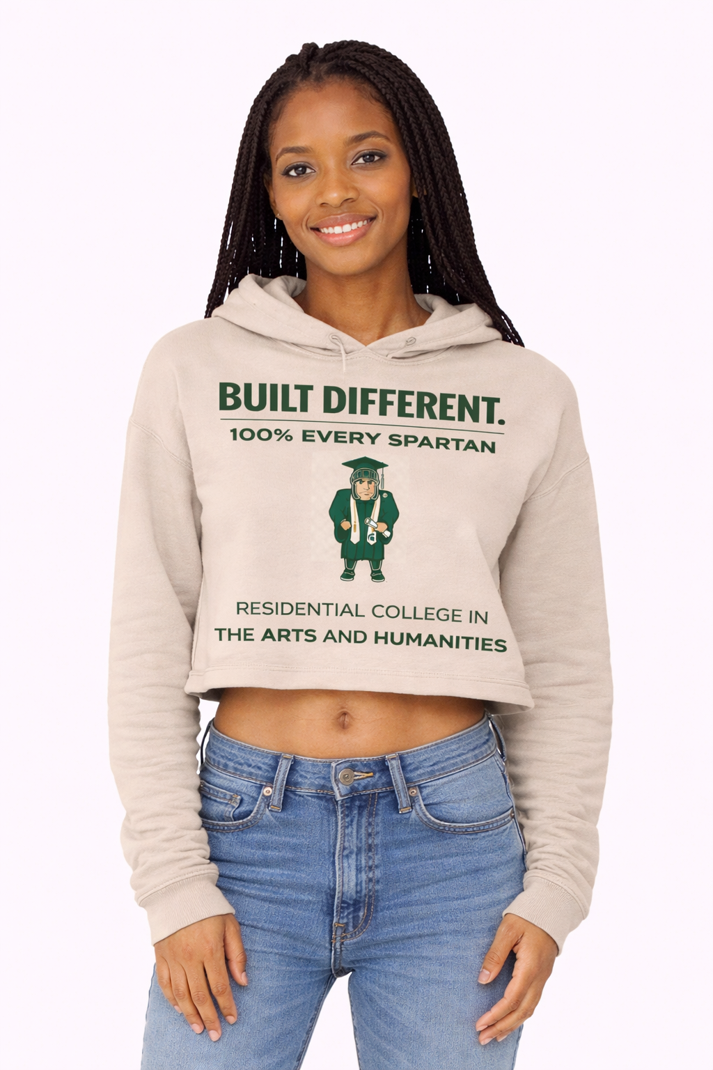 A person wears a beige cropped hoodie with 