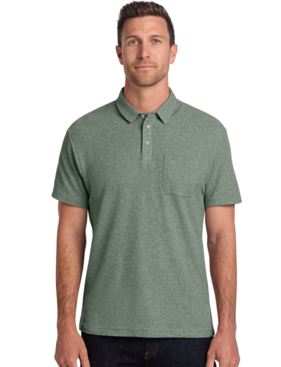 Green polo shirt with a breast pocket. Text on pocket says 