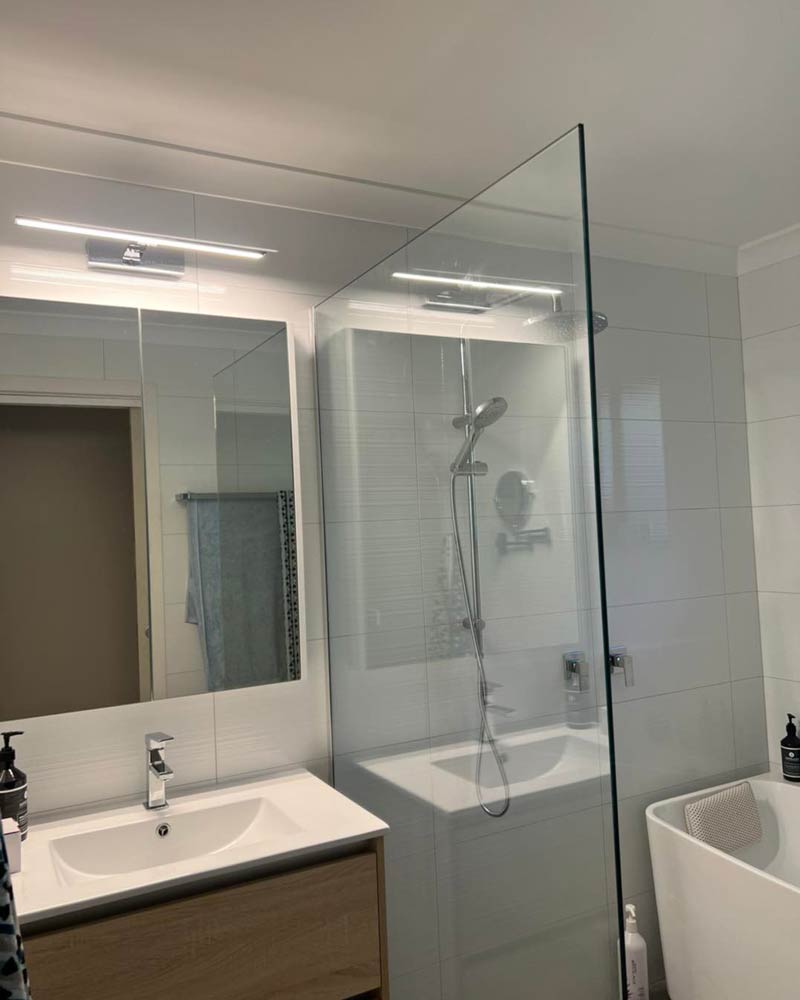 LED Tube Installed Above Bathroom Mirror — Electrical Services In Corowa, NSW