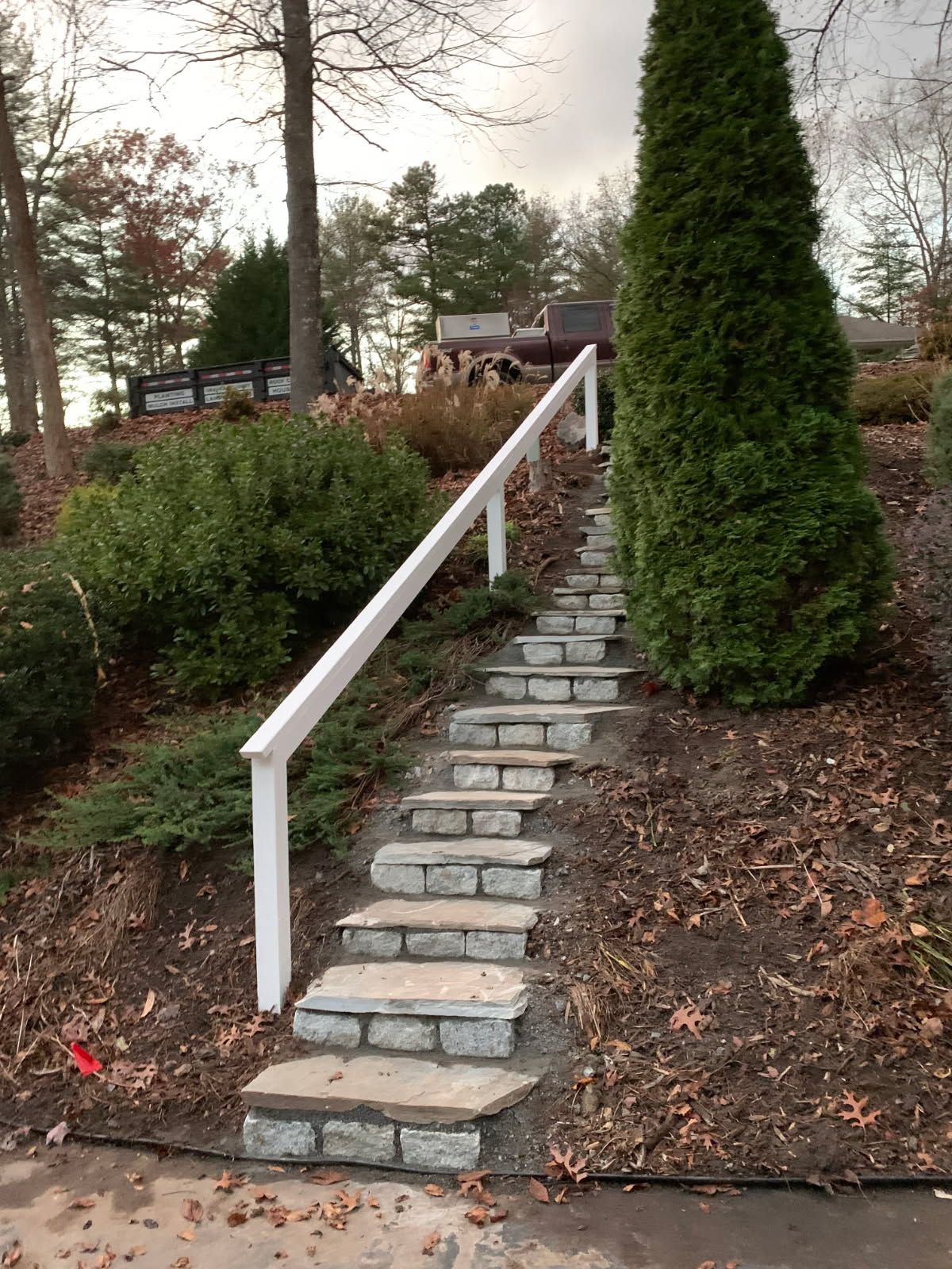 steep staircase with hand rail