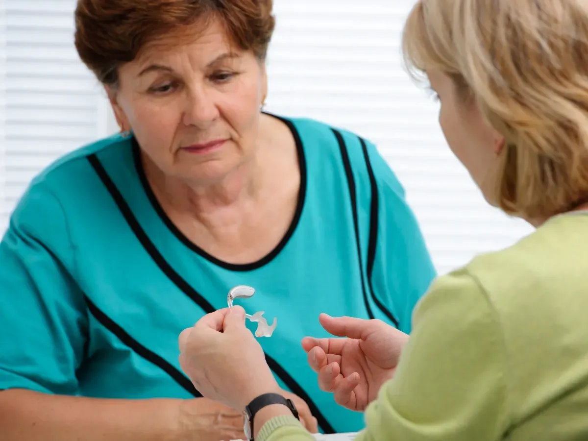 A hearing aid consultation discussing key differences in technology, models, sound quality