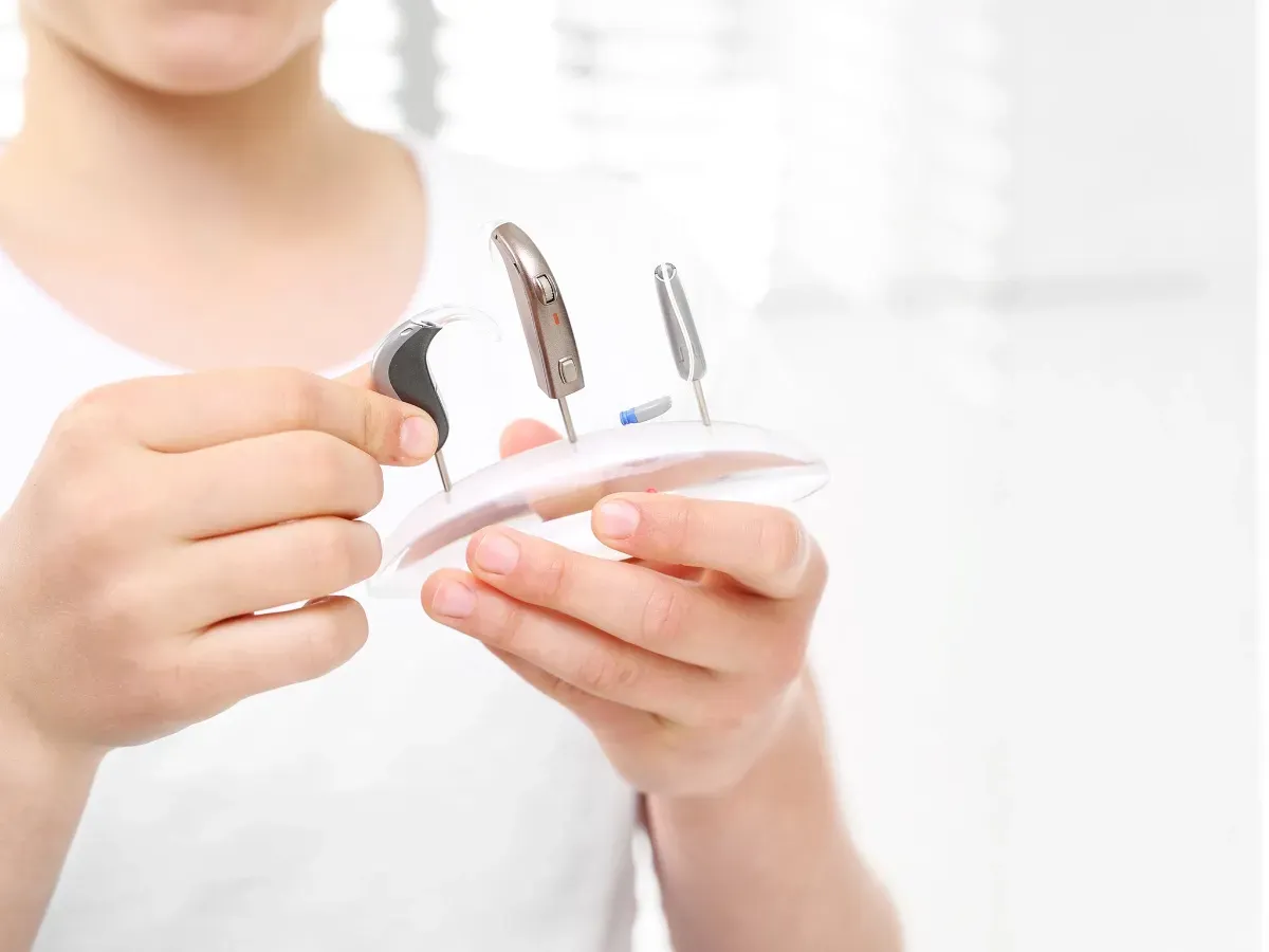 Display of various Resound hearing aid models, highlighting their unique designs and features.