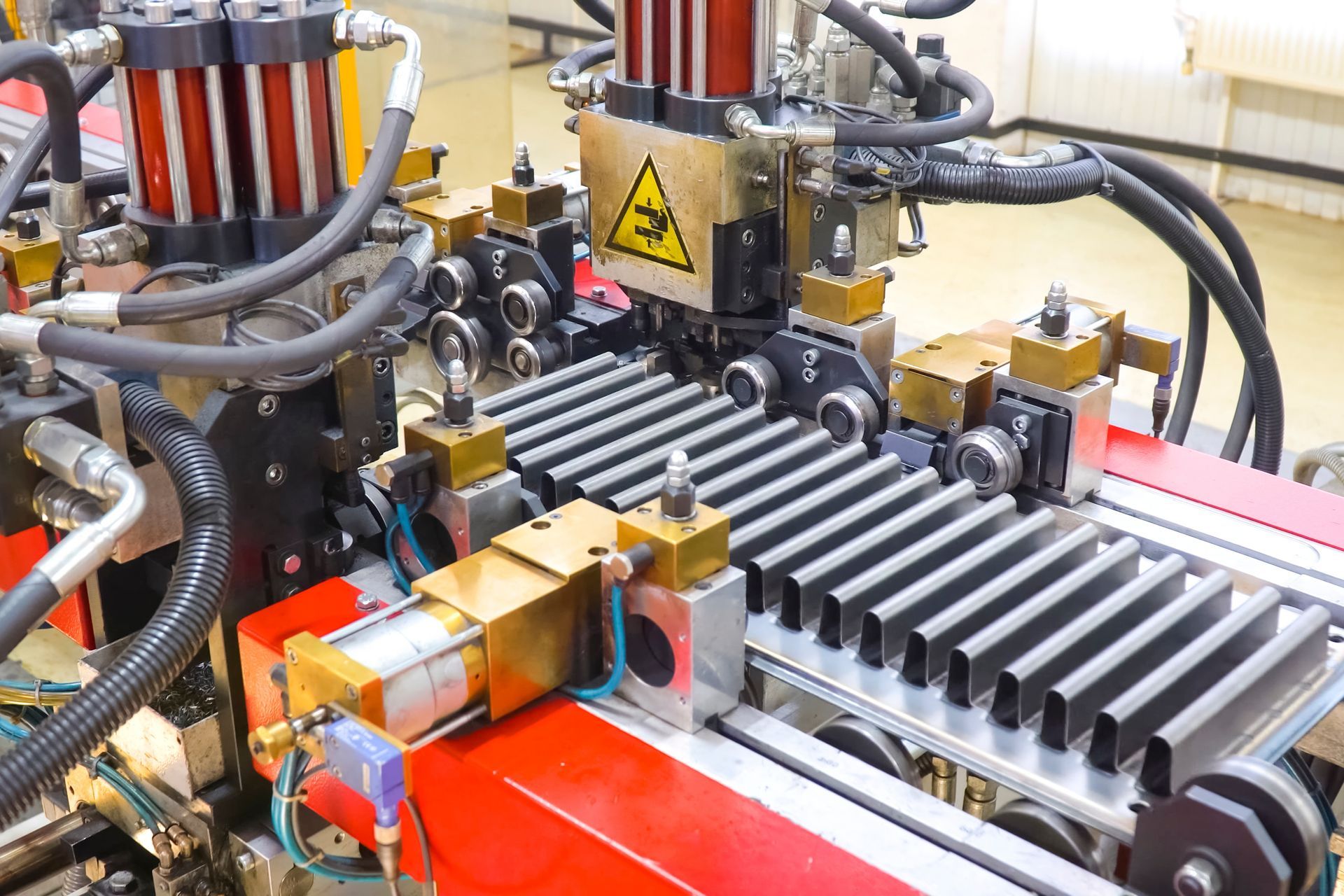 Equipment for manufacture of heavy-duty radiators in a factory with machines.