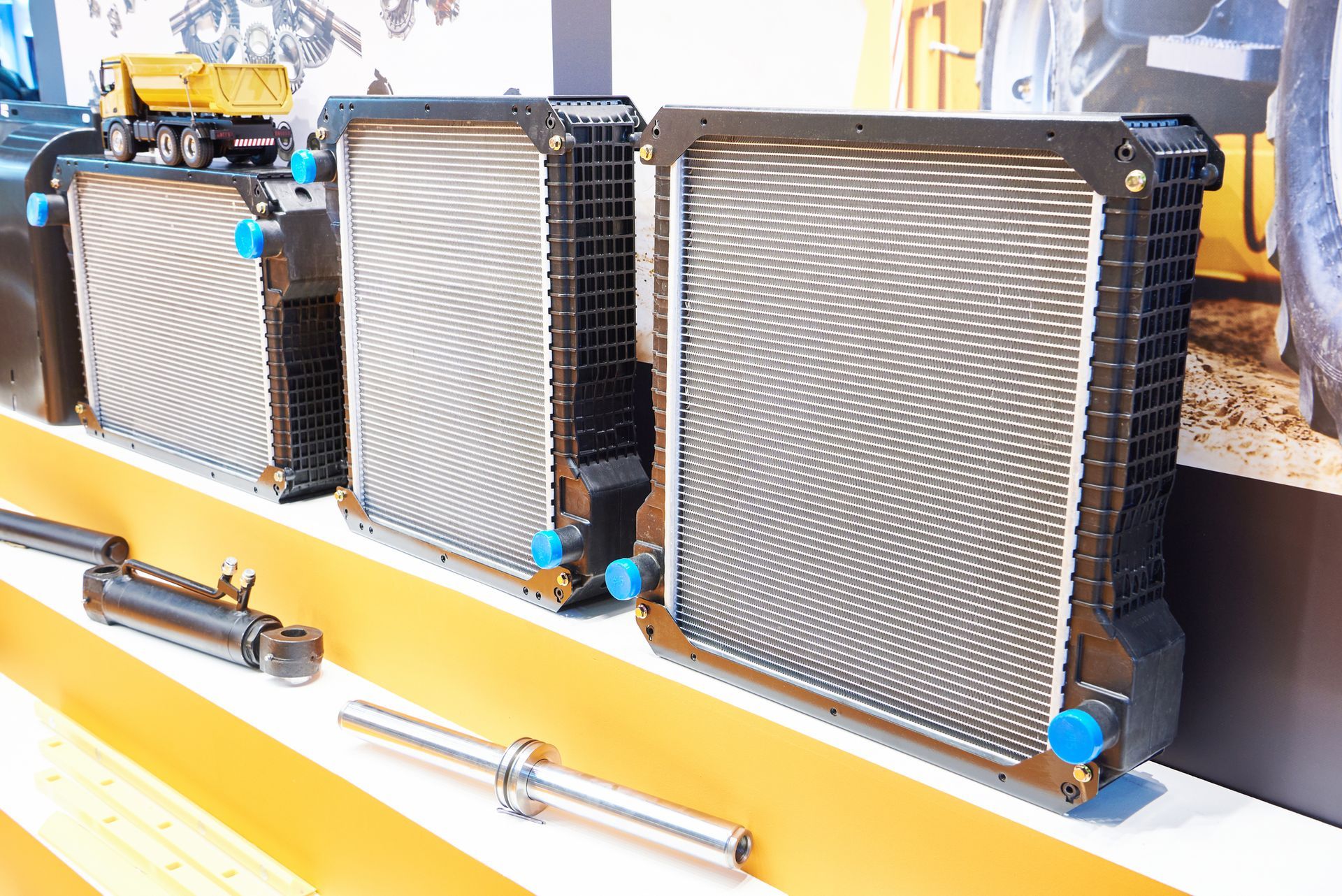 Convective industrial radiators for trucks, placed on a white and yellow counter. Convective industrial radiators for trucks, placed on a white and yellow counter.