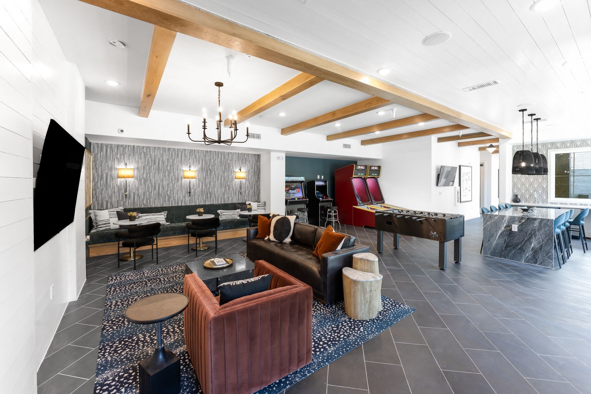 A living room filled with furniture and a television at The Bennett, offers apartments in Austin, TX.