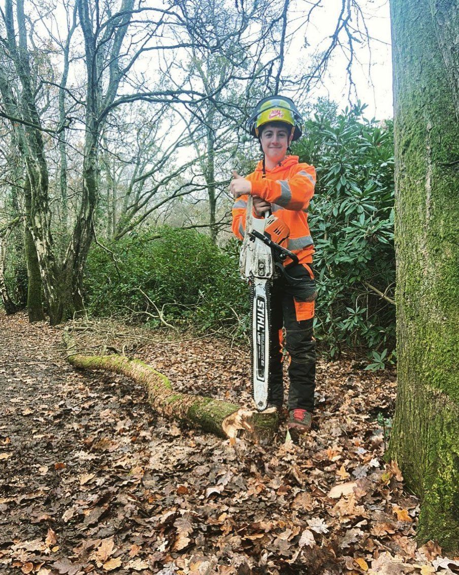 apprentice with chainsaw