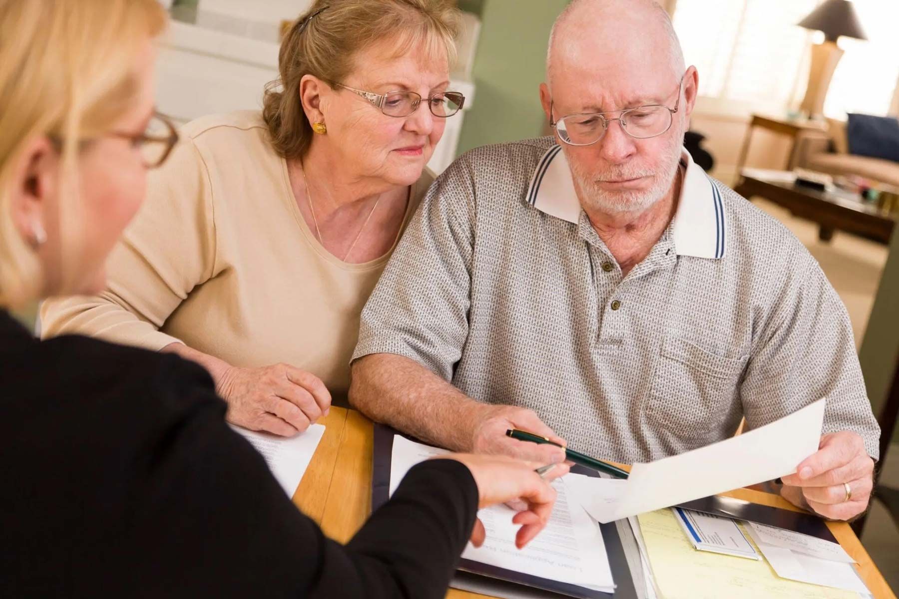 Senior Adult Couple Reviewing Documents — Wilmington, NC — Accounting By Jerry