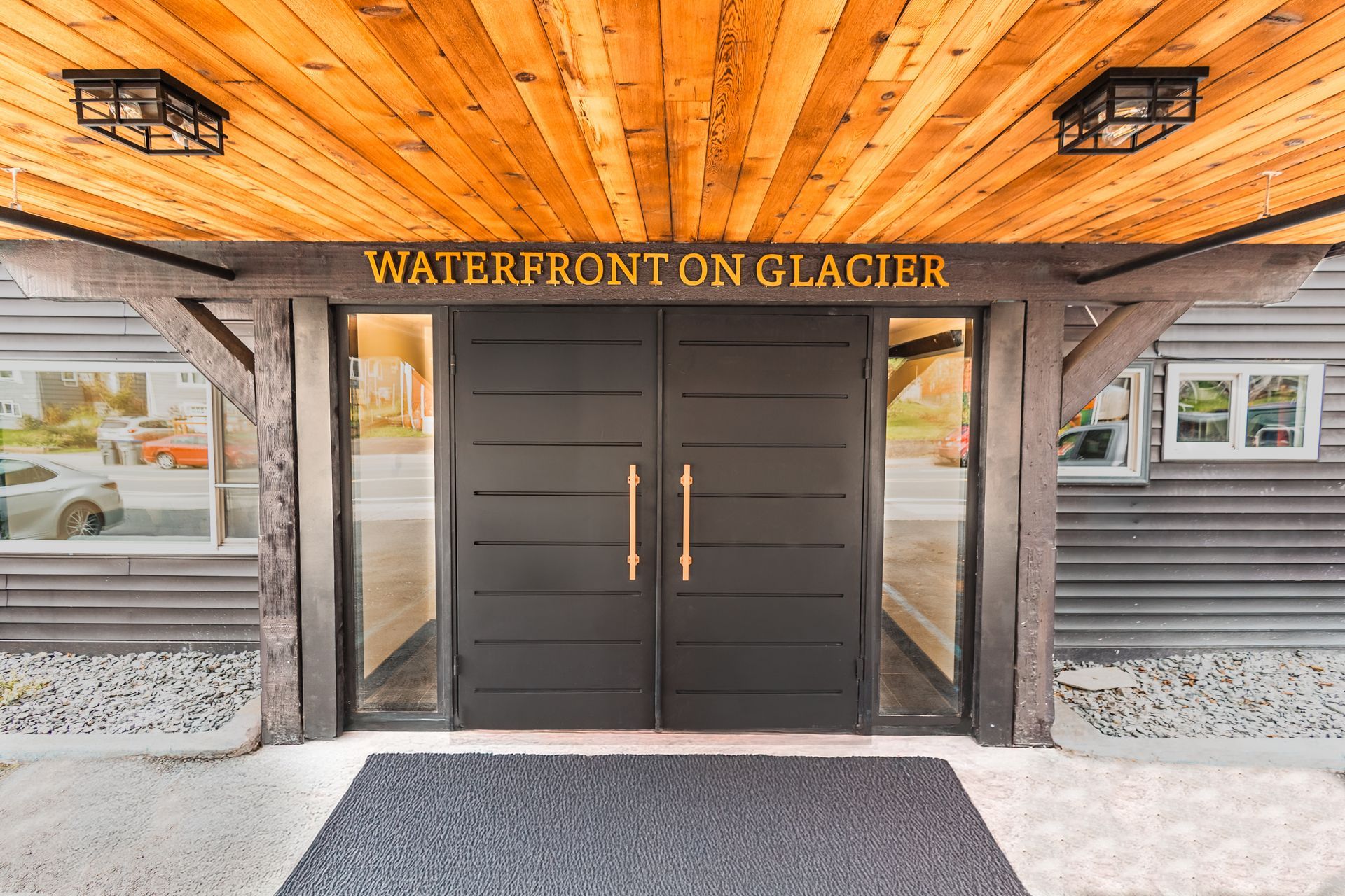 A building with a sign that says waterfront on glacier