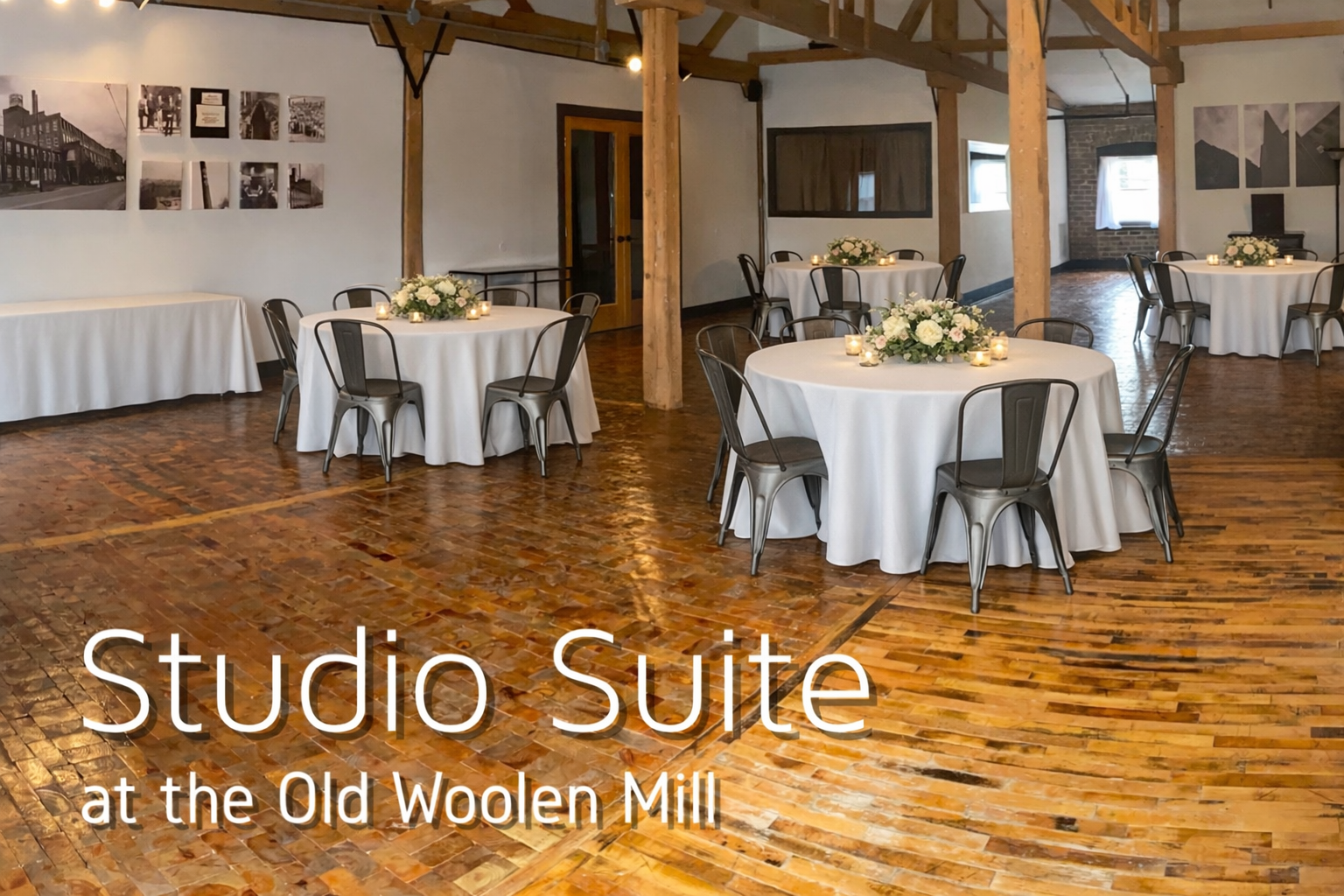 A large room with tables and chairs and the words studio suite at the old woolen mill