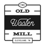 A black and white logo for the old woolen mill in cleveland , tn.