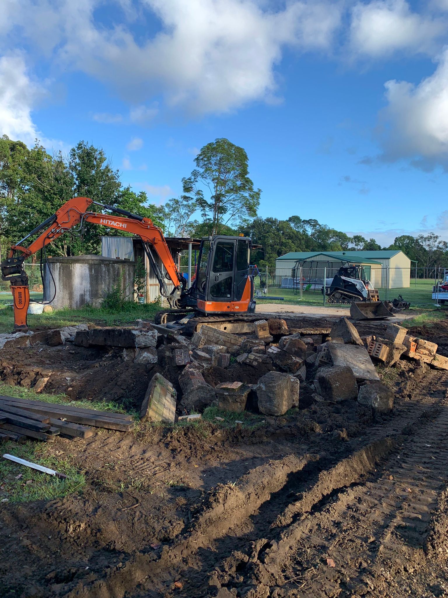 Tractor Auger Machine — Excavation and Demolition Services in Corindi Beach, NSW