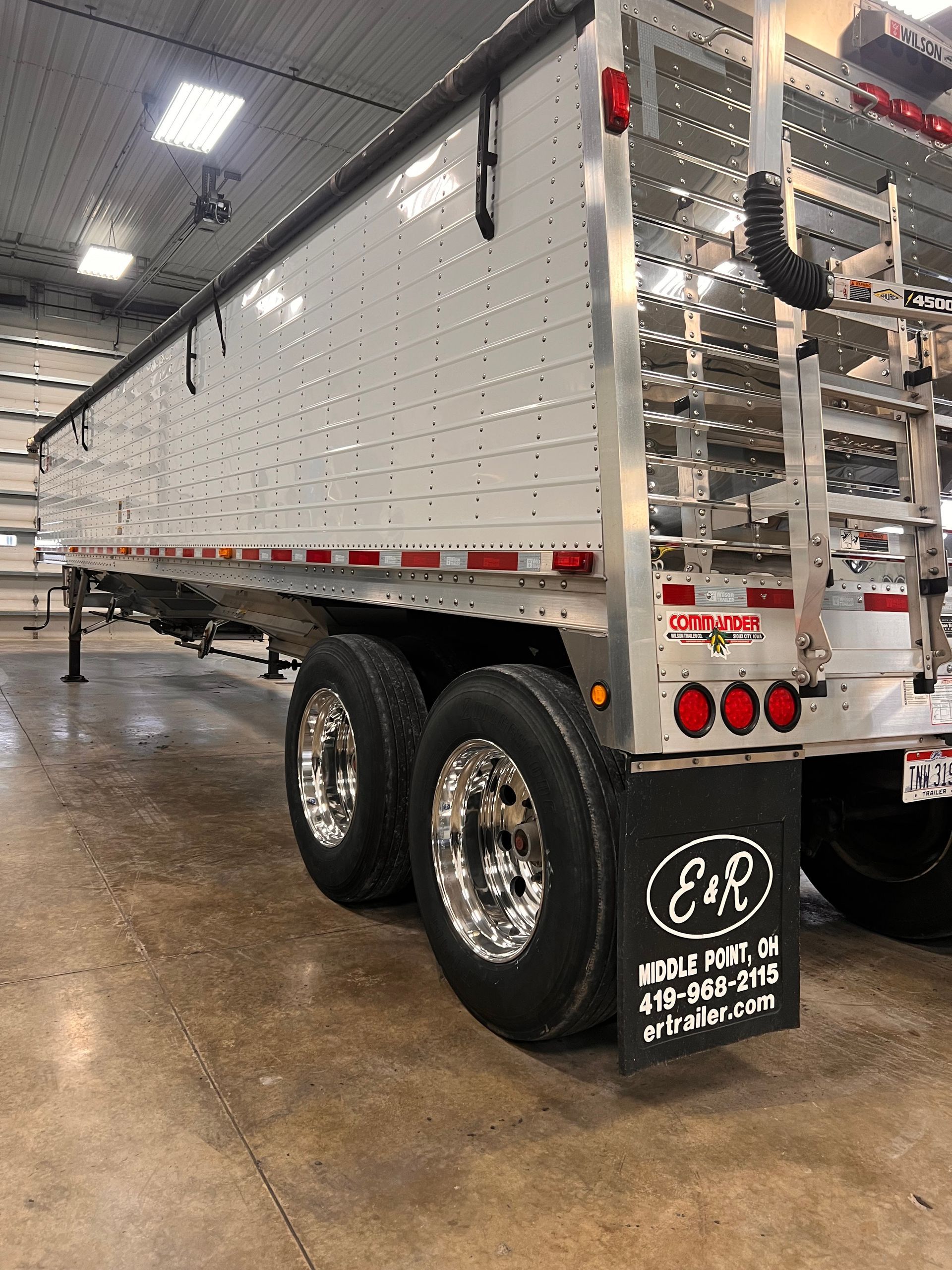 A close up of a chrome wheel on a car