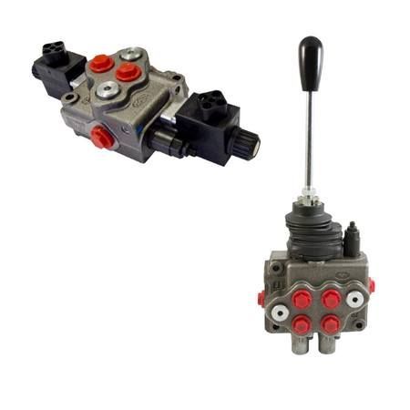 Un paio di valvole idrauliche con maniglie su sfondo bianco.